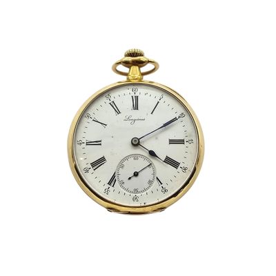 a gold pocket watch with roman numerals on the face