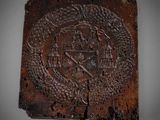 an image of a piece of wood with a design on it