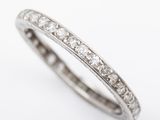 a close up view of a white gold diamond eternity ring
