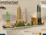 a box with a model of the statue of liberty in it