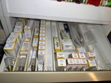 a drawer full of spices and spices in a kitchen