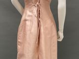 a mannequin wearing a pink dress on a mannequin mannequin mannequin mannequin mannequin mannequin mannequin mann