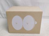 packaging of a box with a pair of white buttons on it