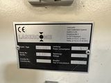 a close up of a camera mounted on a wall