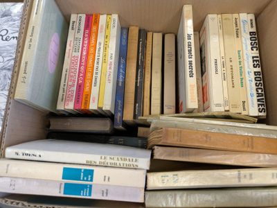 a box full of books sitting on a table