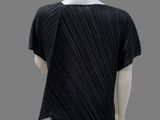 a mannequin mannequin wearing a black top and black pants