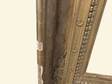 a picture of a gold frame with a mirror in it