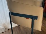 a chair that is sitting in front of a window