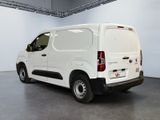 a white van that is parked in a garage