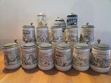 a lot of beer mugs sitting on a table