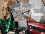 a cardboard box filled with assorted appliances and other items