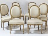 six antique french style dining chairs with white upholstered seats