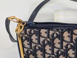 an image of a purse with a gold handle