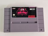 a close up of a nintendo game on a white surface