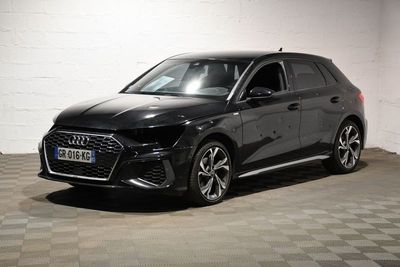 the audi e - trc is parked in a garage