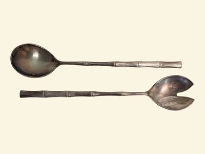 two spoons and a spoon on a white background