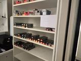 a pantry with a lot of spices on the shelves
