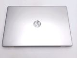 a laptop that is sitting on a white table