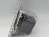 a small plastic object that is sitting on top of a table
