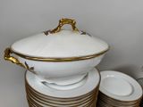 a lot of plates and bowls stacked on top of each other