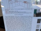 a box with a picture of a kitchen in it on a table