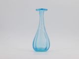 an image of a blue glass vase on a white background