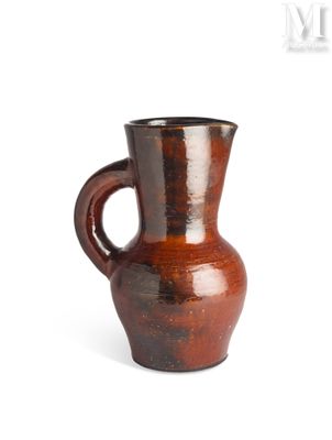 a brown vase with a handle on a white background