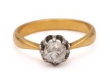 a close up of a diamond ring on a white background