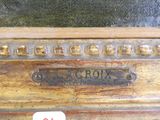 a close up of a wooden box with a label on it