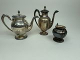 two silverplated teapots and a small silverplated teapot