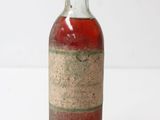 a bottle of wine that is sitting on a table
