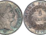 a close up of a coin with an image of a woman on it