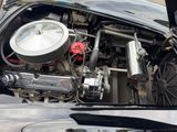 two pictures of a car with the hood open and the engine in the back