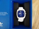 adidas watch with white strap and blue dial in a blue box