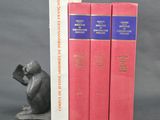 trois serre-livres en forme de souris et de livre