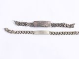 two silver bracelets with a silver clasp and a silver chain