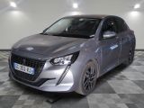 la photo d'une voiture argentée garée dans un garage