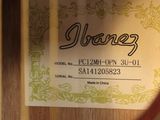 a close up of a guitar with a label on it
