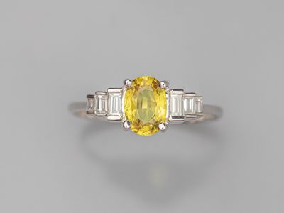 a yellow sapphire and diamond ring