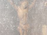 a picture of a man on the cross in the window