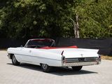 a white and red convertible car parked in a parking lot