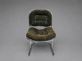 an image of a chair with a cushion on top of it