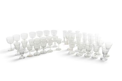 a lot of wine glasses that are sitting on the table