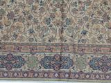an image of a large oriental rug on a white surface