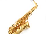 an image of a gold saxophone on a white background