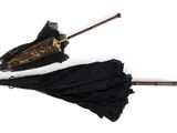 two umbrellas that are sitting next to each other