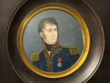 tableau représentant un homme en uniforme militaire, dans un cadre noir