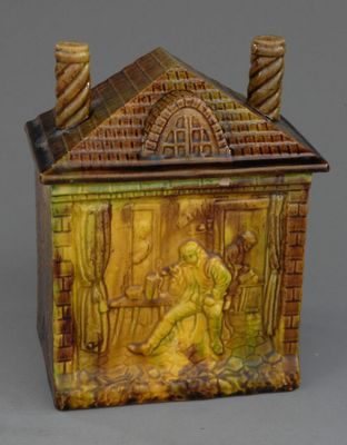 Pot à tabac rectangulaire figurant une maison en briques ave…