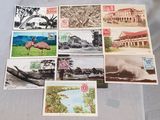 some old postcards of different types and sizes are on a table