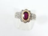 une photo d'une bague sertie d'un rubis